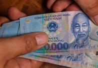 Việt kiều bị hoãn xuất cảnh vì nộp thừa thuế 40.000 đồng